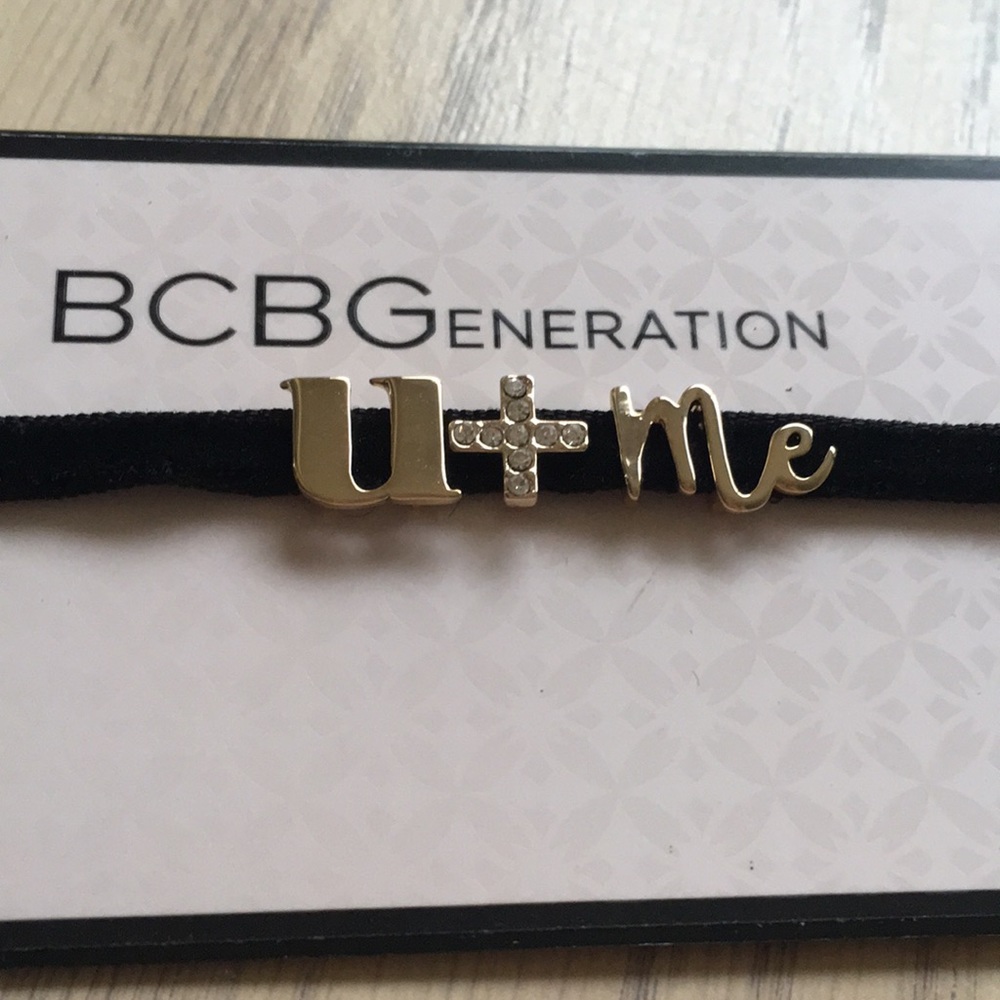 BCBG gold on a black velvet choker necklace